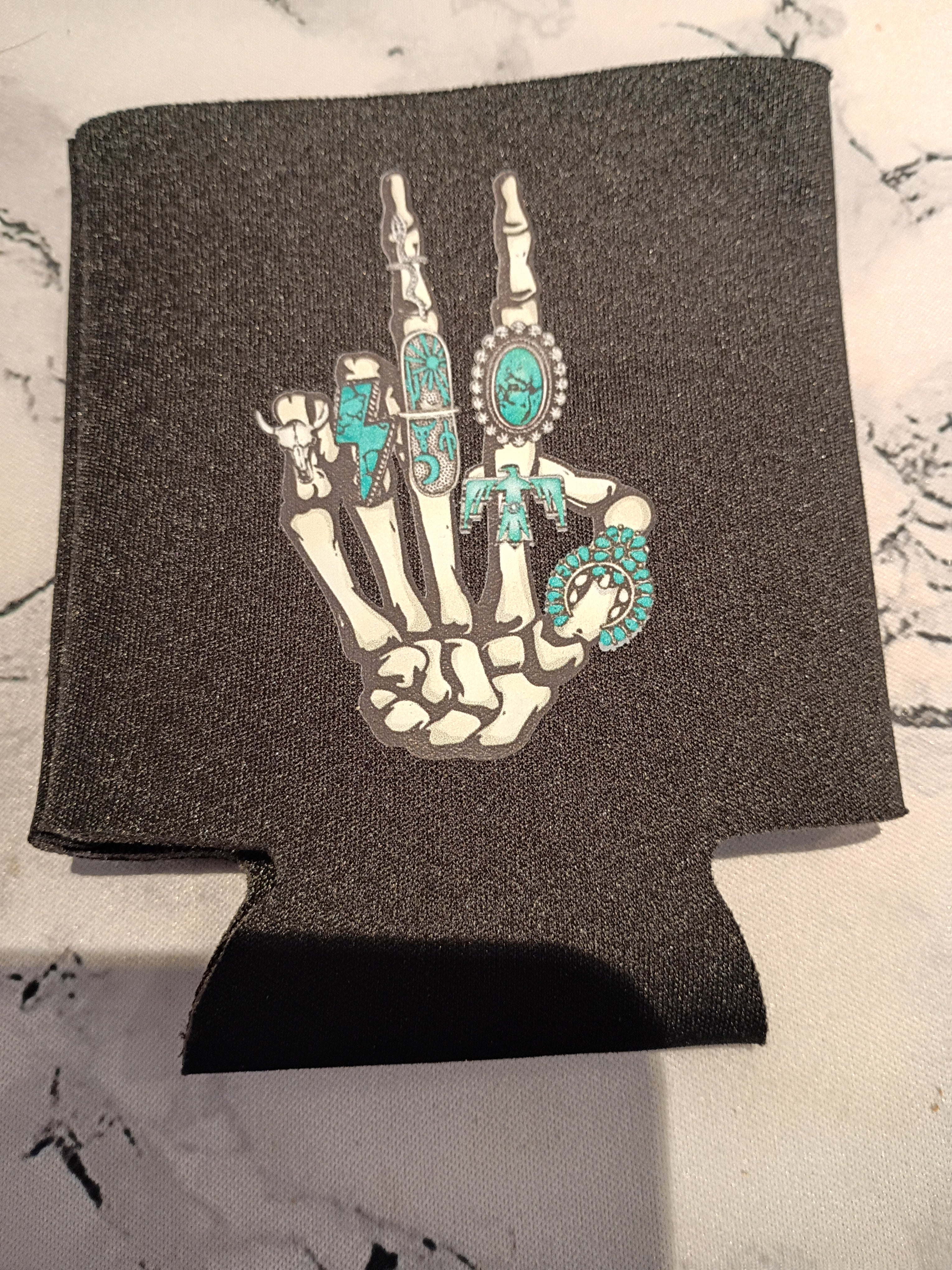 Skeleton hand peace sign